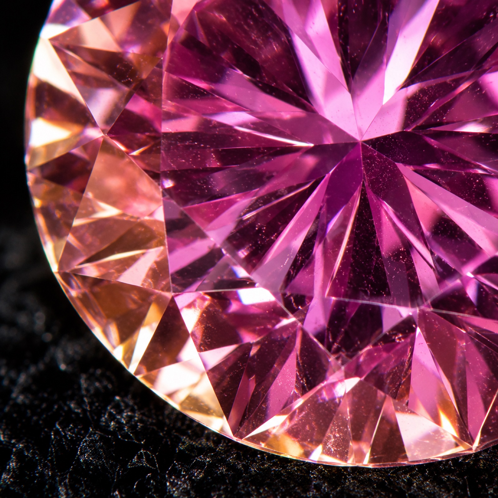 Macro photograph of an Argyle pink diamond's facets